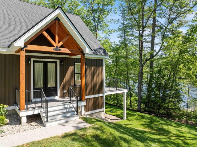 74 Scenic View Rd, Ashland, NH 03217 - entrance to property featuring roof with shingles and a lawn