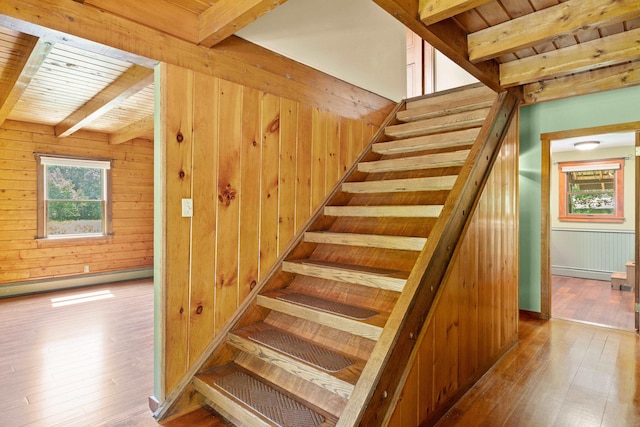 43 Knights Pond Rd, South Berwick, ME 03908 - staircase with a baseboard radiator, hardwood / wood-style floors, a wood ceiling with exposed beams, and wood walls