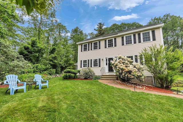 21 Winter Dr, Hooksett, NH 03106 - colonial inspired home with a front lawn and entry steps