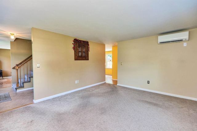 21 Winter Dr, Hooksett, NH 03106 - unfurnished room with a wall mounted AC, carpet flooring, and stairs