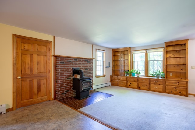 144 Packers Falls Rd, Durham, NH 03824 - living room with a wood stove and baseboard heating