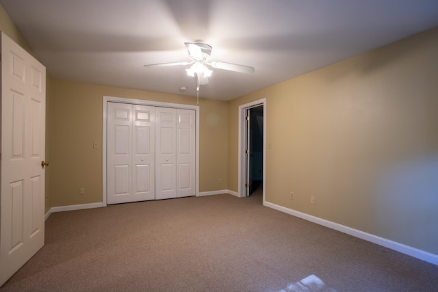 144 Packers Falls Rd, Durham, NH 03824 - unfurnished bedroom with carpet flooring, a closet, and a ceiling fan