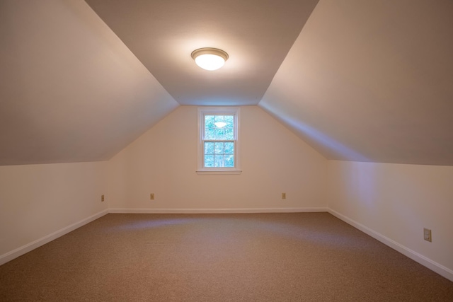 144 Packers Falls Rd, Durham, NH 03824 - additional living space featuring lofted ceiling and carpet floors