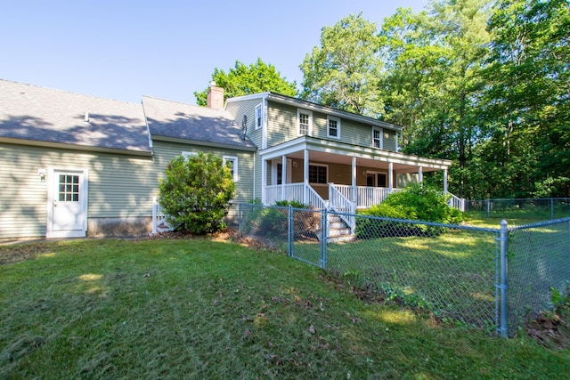 144 Packers Falls Rd, Durham, NH 03824 - back of property with covered porch and a chimney