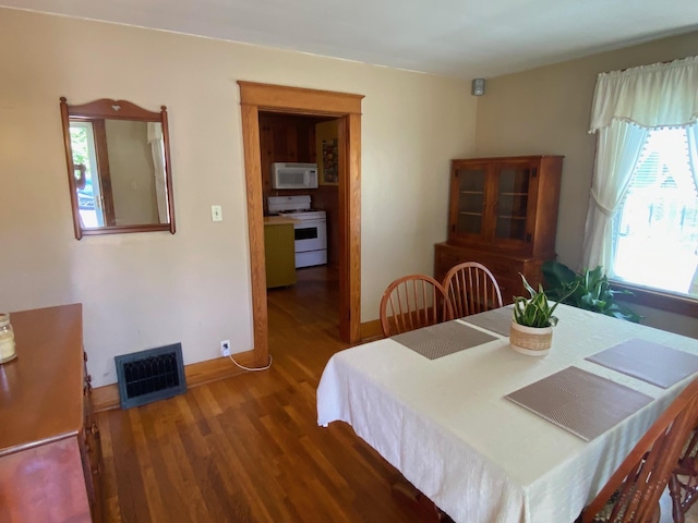 34 Dewey St, Springfield, VT 05156 - dining space featuring wood finished floors and baseboards