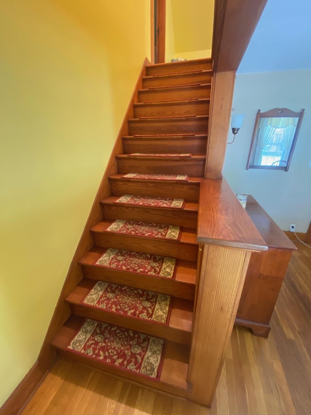 34 Dewey St, Springfield, VT 05156 - stairway featuring wood finished floors