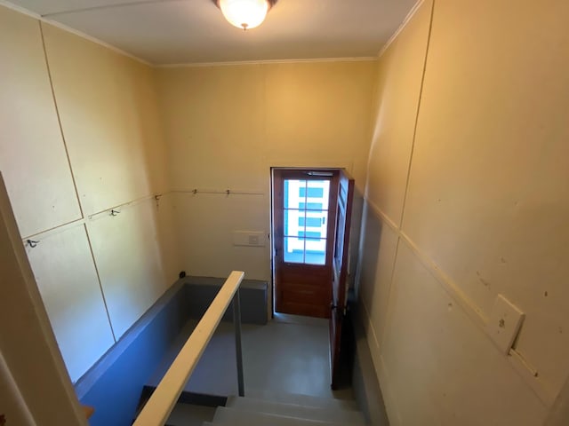 34 Dewey St, Springfield, VT 05156 - stairway with crown molding and a decorative wall
