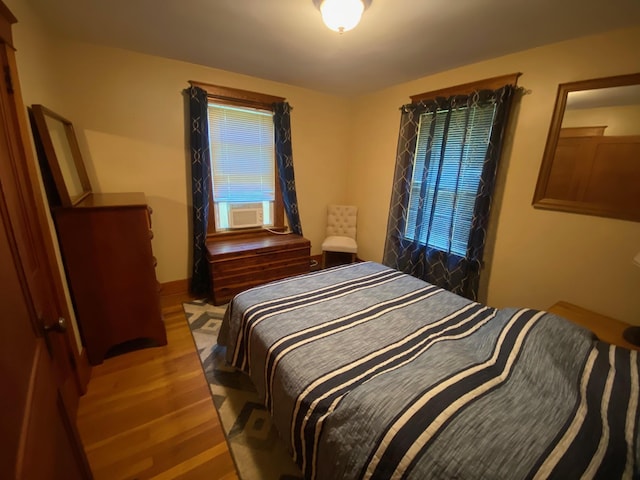 34 Dewey St, Springfield, VT 05156 - bedroom with wood finished floors and cooling unit