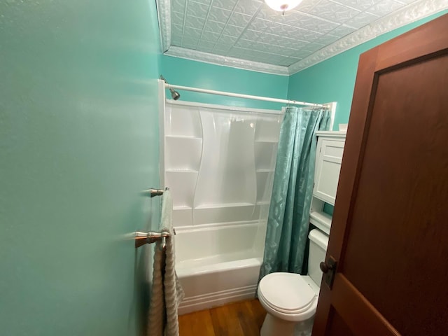 34 Dewey St, Springfield, VT 05156 - bathroom with wood finished floors, shower / bath combo with shower curtain, and an ornate ceiling