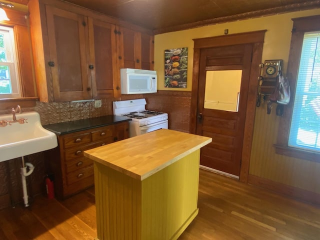34 Dewey St, Springfield, VT 05156 - kitchen featuring white appliances, wooden counters, wood finished floors, and brown cabinets