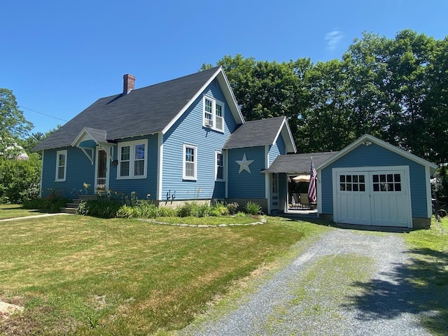 34 Dewey St, Springfield, VT 05156 - view of front of home featuring driveway, a front yard, a chimney, a garage, and a shingled roof