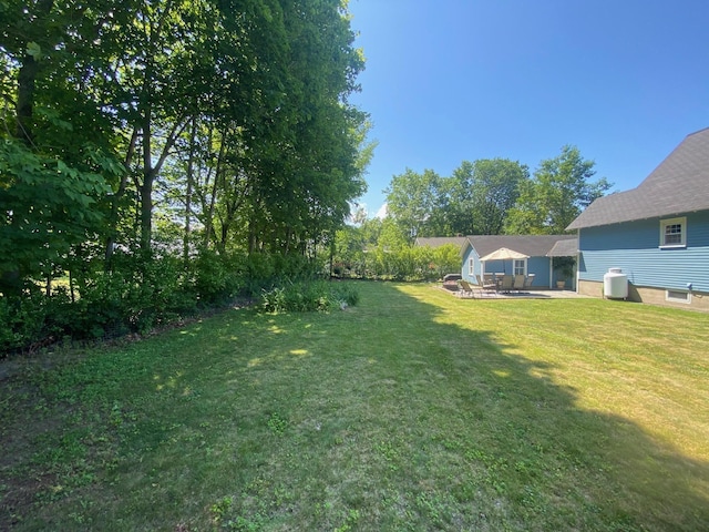 34 Dewey St, Springfield, VT 05156 - view of green lawn with a patio