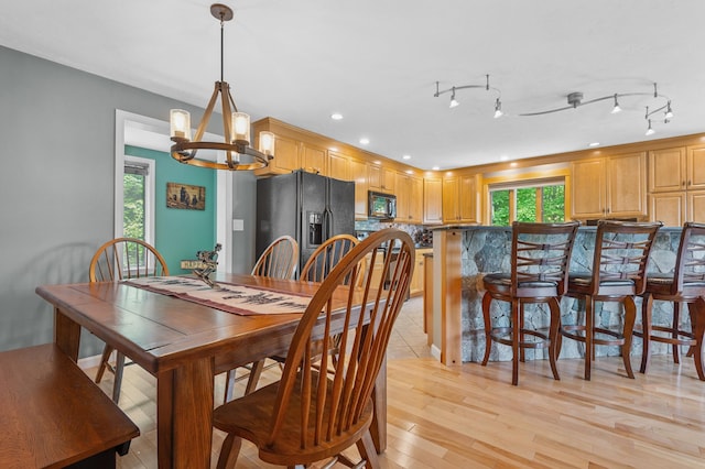 53 Ammonoosuc Dr, Bartlett, NH 03812 - dining area with a chandelier, healthy amount of natural light, light wood-style floors, and recessed lighting