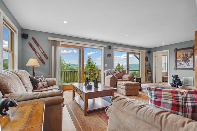 53 Ammonoosuc Dr, Bartlett, NH 03812 - living area featuring healthy amount of natural light, recessed lighting, and wood finished floors