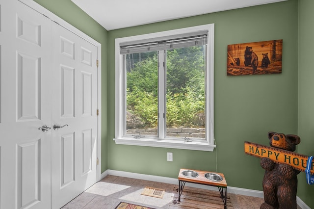 53 Ammonoosuc Dr, Bartlett, NH 03812 - sitting room with baseboards and light tile patterned flooring
