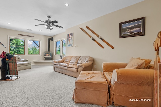 53 Ammonoosuc Dr, Bartlett, NH 03812 - carpeted living room featuring a wood stove, recessed lighting, and a ceiling fan