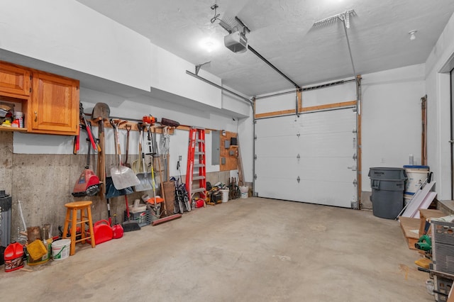 53 Ammonoosuc Dr, Bartlett, NH 03812 - garage with a garage door opener and electric panel