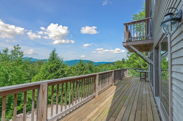 53 Ammonoosuc Dr, Bartlett, NH 03812 - wooden terrace with a mountain view