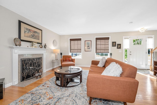 4 Chestnut St, Hudson, NH 03051 - living room featuring wood finished floors and a high end fireplace
