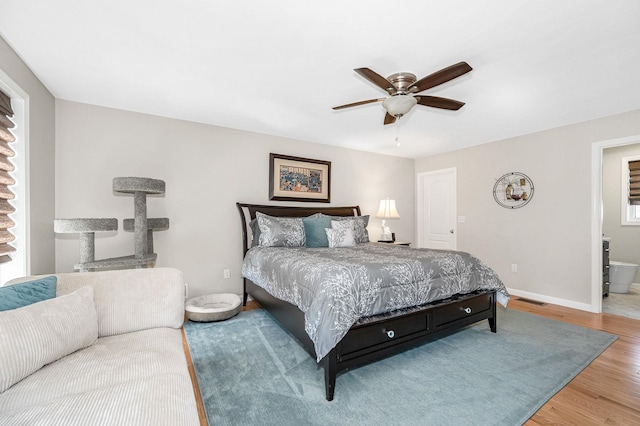 4 Chestnut St, Hudson, NH 03051 - bedroom with wood finished floors, a ceiling fan, and ensuite bath