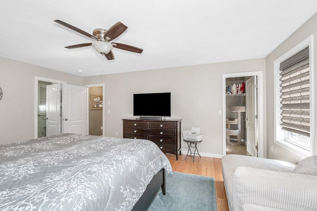 4 Chestnut St, Hudson, NH 03051 - bedroom with wood finished floors, a ceiling fan, and a spacious closet