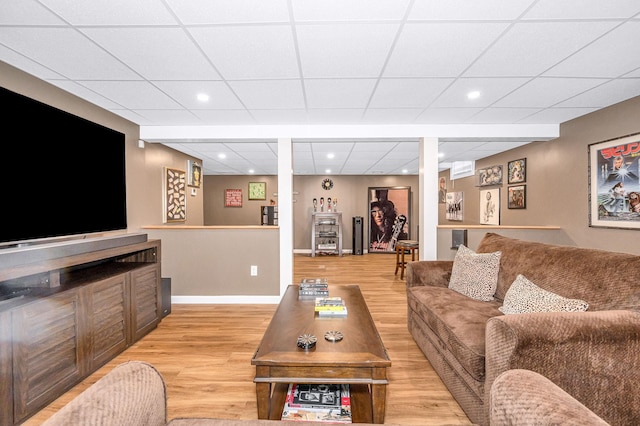 4 Chestnut St, Hudson, NH 03051 - living room featuring wood finished floors, a paneled ceiling, and recessed lighting