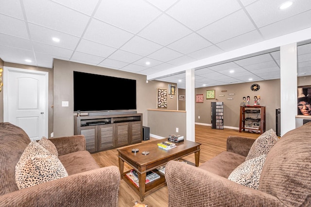 4 Chestnut St, Hudson, NH 03051 - living room featuring a paneled ceiling, wood finished floors, and recessed lighting