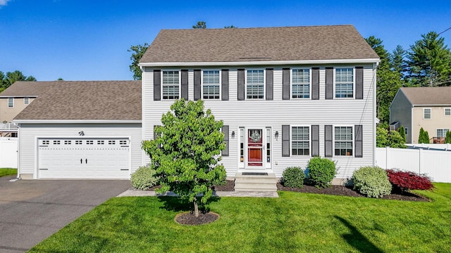 4 Chestnut St, Hudson, NH 03051 - colonial home with driveway and an attached garage