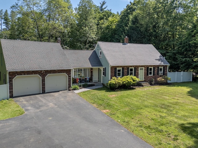 5 Catskill Dr, Merrimack, NH 03054 - cape cod home with brick siding, an attached garage, driveway, a chimney, and roof with shingles