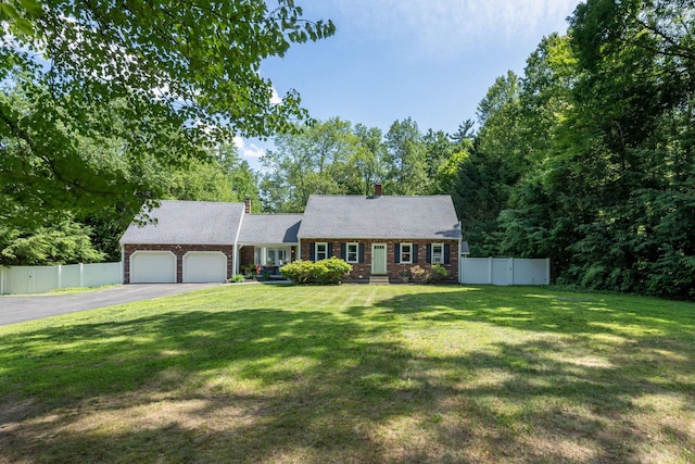 5 Catskill Dr, Merrimack, NH 03054 - view of front facade featuring a garage and asphalt driveway