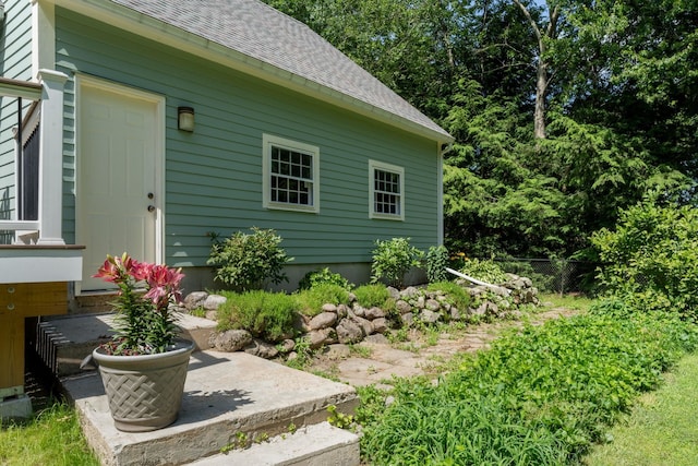 5 Catskill Dr, Merrimack, NH 03054 - view of property exterior with roof with shingles and a patio