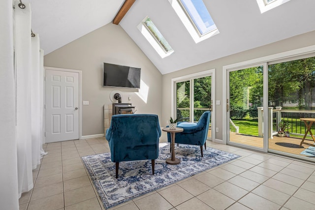 5 Catskill Dr, Merrimack, NH 03054 - living area featuring a skylight, light tile patterned flooring, healthy amount of natural light, beamed ceiling, and high vaulted ceiling