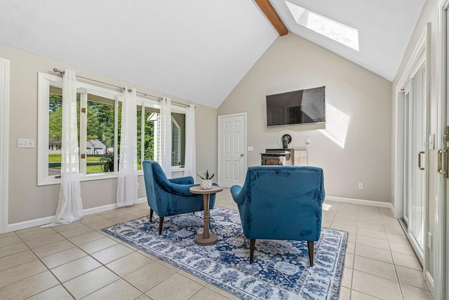 5 Catskill Dr, Merrimack, NH 03054 - living area featuring light tile patterned floors, a skylight, high vaulted ceiling, and beam ceiling
