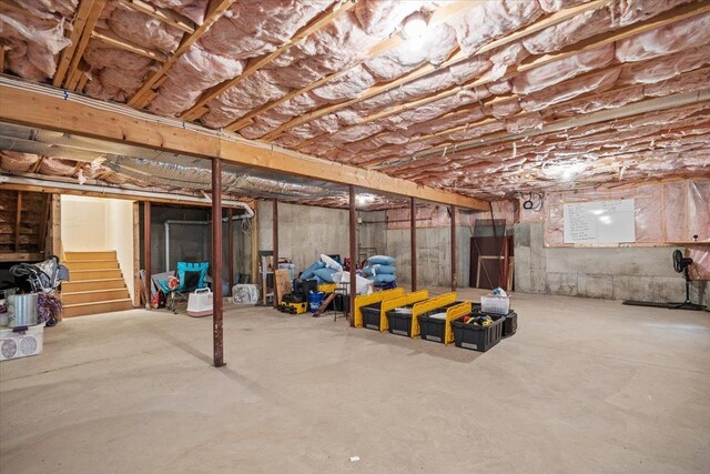 23 Surrey Ln, Laconia, NH 03246 - unfinished below grade area with stairway