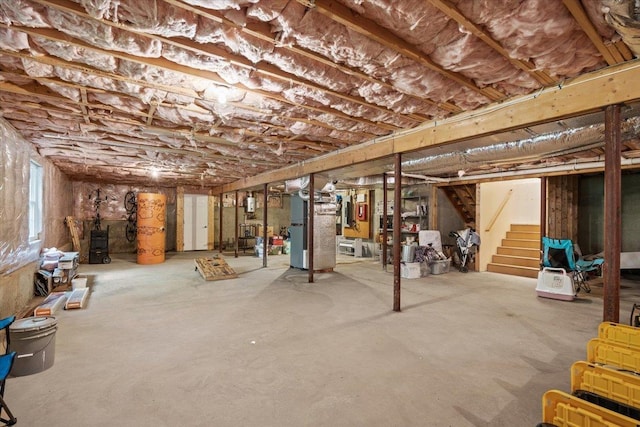 23 Surrey Ln, Laconia, NH 03246 - below grade area featuring stairway and heating unit