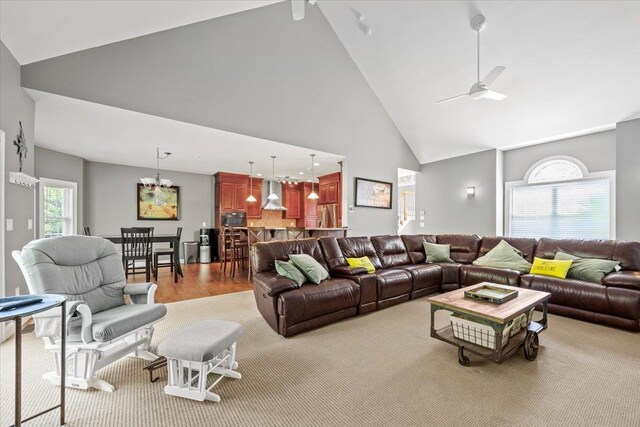 23 Surrey Ln, Laconia, NH 03246 - living room featuring high vaulted ceiling, a ceiling fan, and light wood-style floors