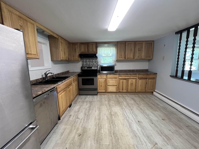 2 Kimball Ter, Danville, NH 03819 - kitchen with appliances with stainless steel finishes, under cabinet range hood, light wood-type flooring, and a baseboard heating unit