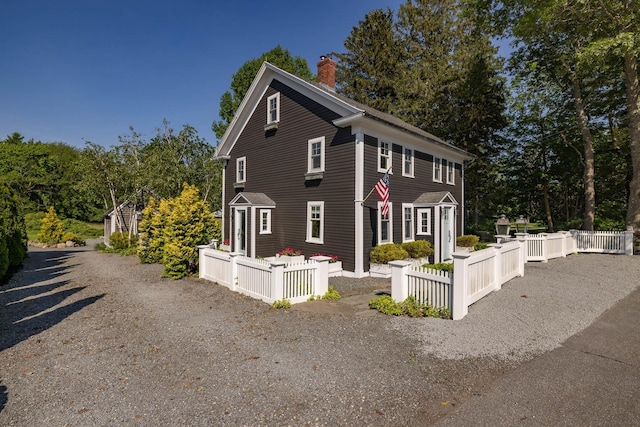 45 Atlantic Ave, North Hampton, NH 03862 - view of side of property featuring a chimney