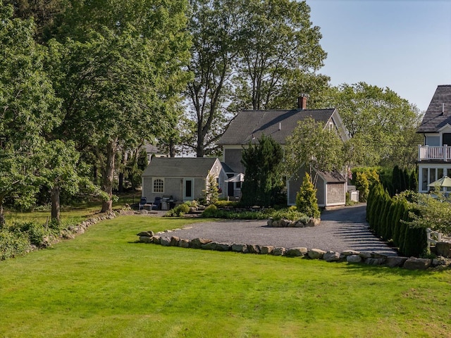 45 Atlantic Ave, North Hampton, NH 03862 - view of front facade with a front yard