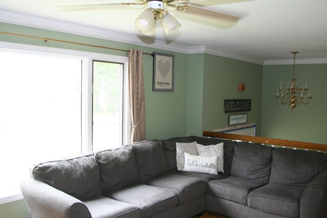 243 Brickett Hill Rd, Pembroke, NH 03275 - living area with ornamental molding, a chandelier, and ceiling fan
