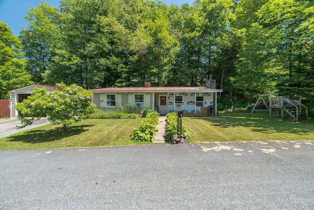 16 Brierbrook Ln, Springfield, VT 05156 - view of front of house featuring a chimney, a front yard, a porch, and driveway