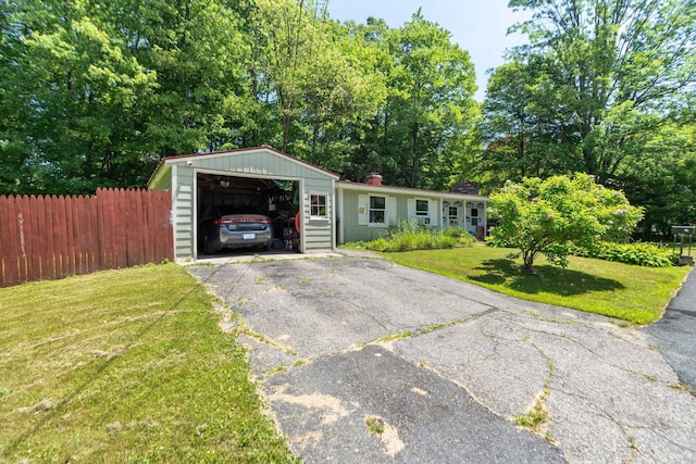 16 Brierbrook Ln, Springfield, VT 05156 - ranch-style house with driveway, a chimney, and an outdoor structure