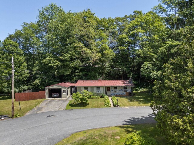 16 Brierbrook Ln, Springfield, VT 05156 - ranch-style house featuring driveway, an attached garage, and a metal roof