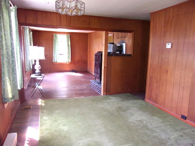 70 Wild Ammonoosuc Rd, Haverhill, NH 03785 - hallway featuring wood walls, carpet flooring, and wood finished floors