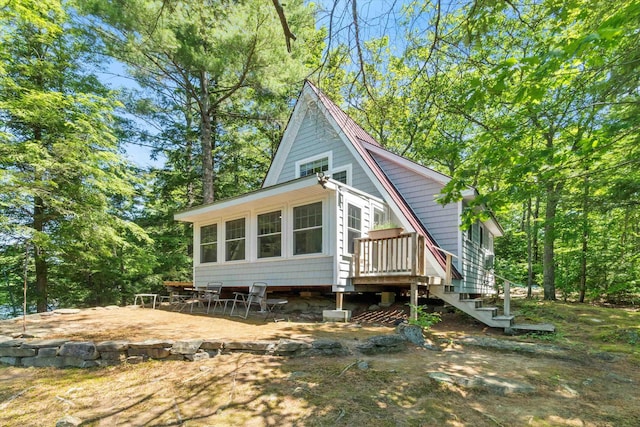 73 Lost Ln, Deering, NH 03244 - view of side of property with stairway and a patio