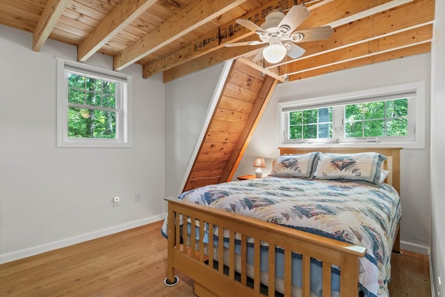 73 Lost Ln, Deering, NH 03244 - bedroom featuring multiple windows, a wooden ceiling with exposed beams, wood finished floors, and a ceiling fan