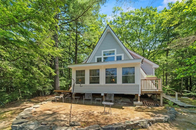 73 Lost Ln, Deering, NH 03244 - back of house with stairway and a wooden deck