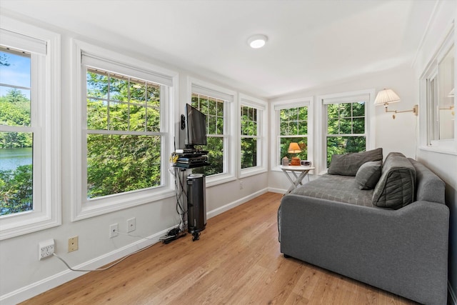 73 Lost Ln, Deering, NH 03244 - living area with healthy amount of natural light, light wood-style flooring, and lofted ceiling