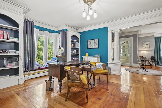11 Palmer Ave, Plaistow, NH 03865 - office area with decorative columns, a baseboard radiator, ornamental molding, and wood-type flooring