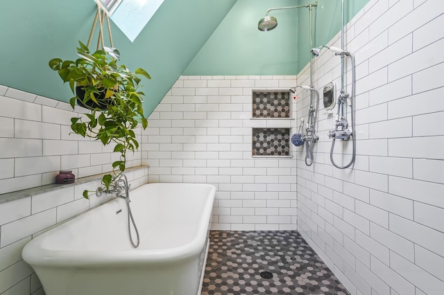 11 Palmer Ave, Plaistow, NH 03865 - full bath featuring tile walls, a skylight, a soaking tub, a tile shower, and lofted ceiling